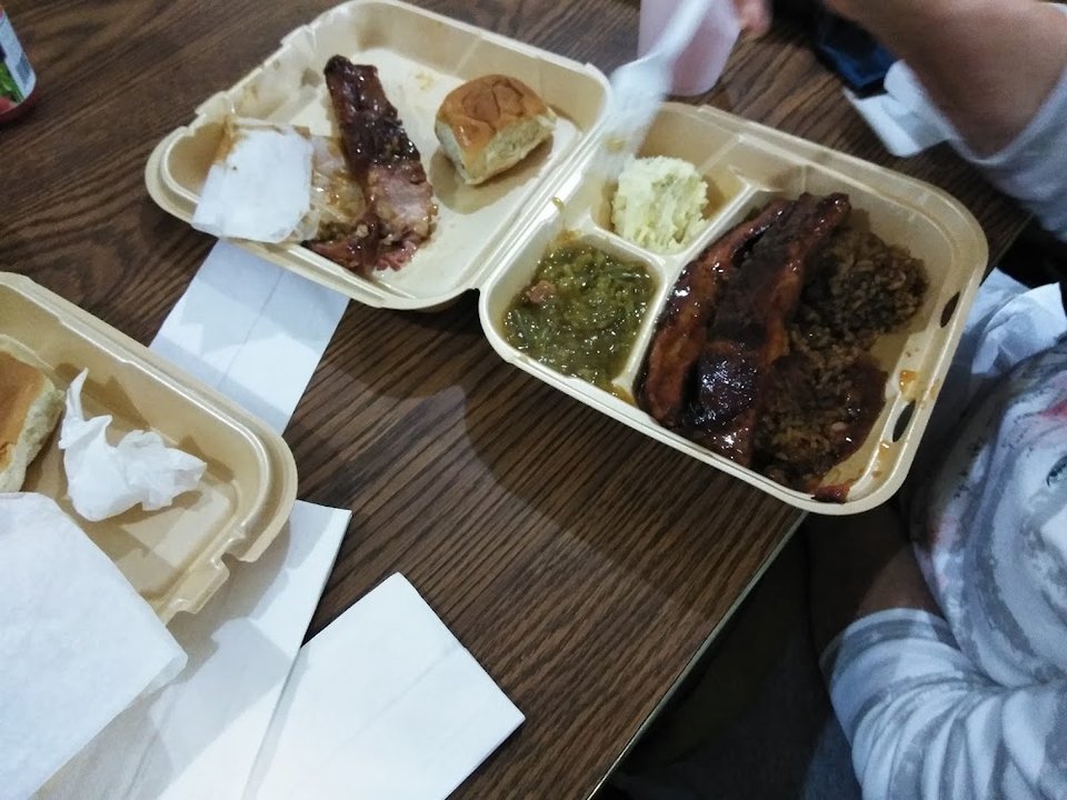 Printed menu with fried catfish and gravy.