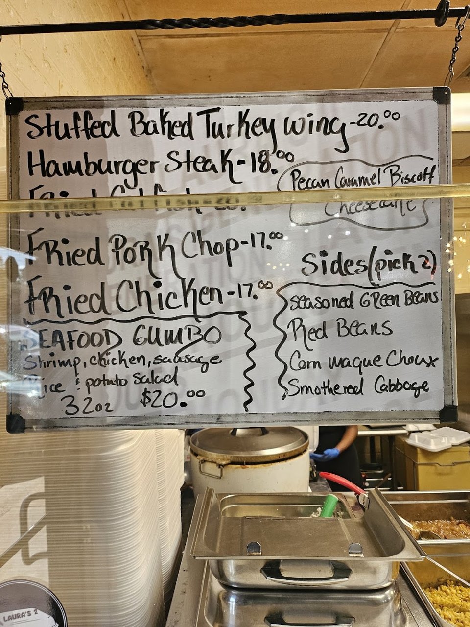 Printed menu with fried catfish and gravy.